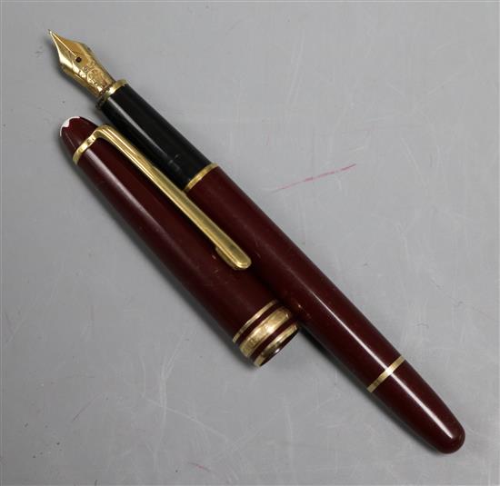 A Mont Blanc Meisterstuck burgundy fountain pen